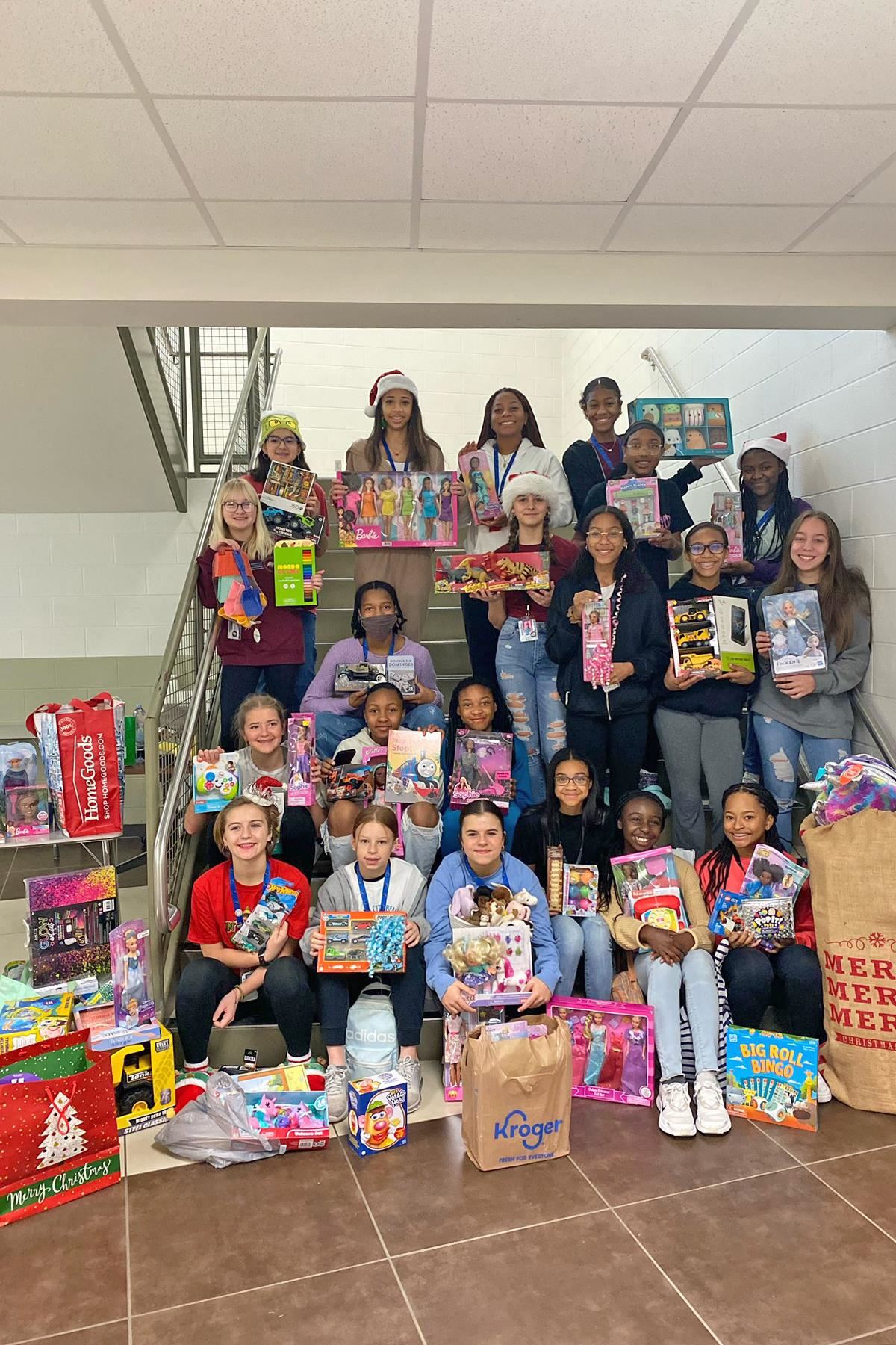 Anthony Middle School girls athletics participates in CALI BEAR toy drive.